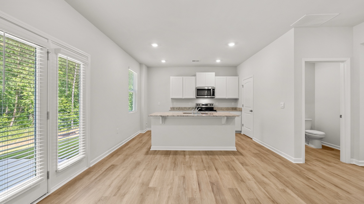 Interior living area open to kitchen with center island