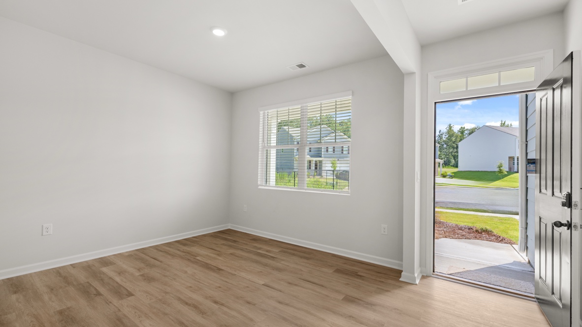 Interior flex room next to entry-way