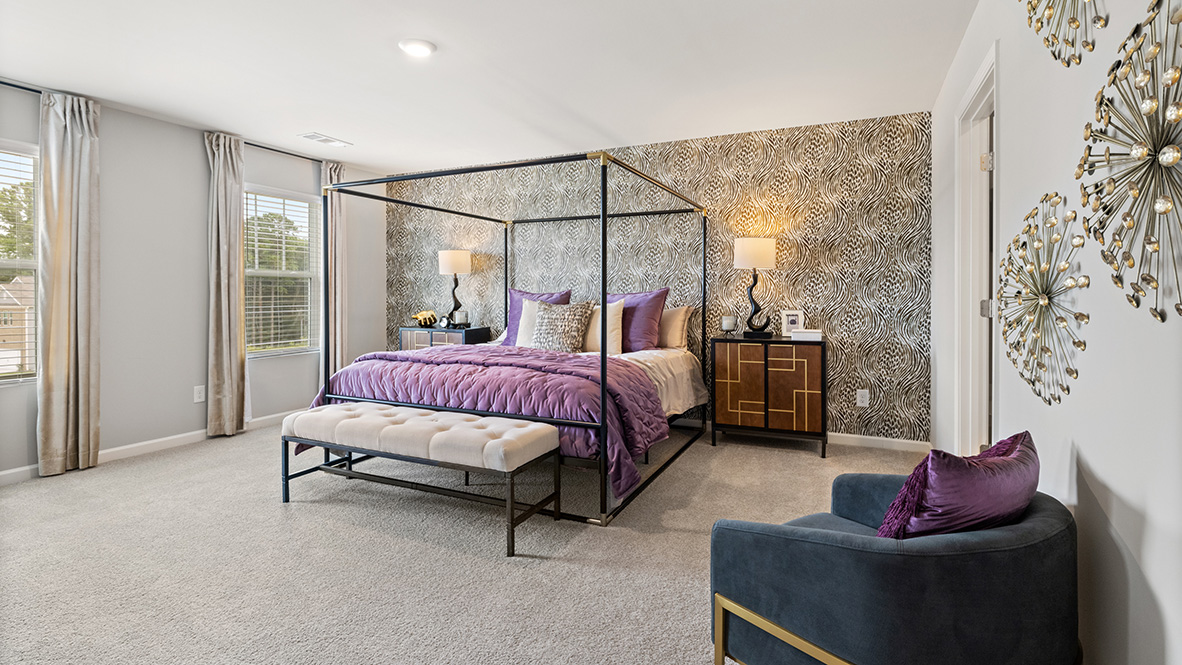 Master bedroom with two single windows.