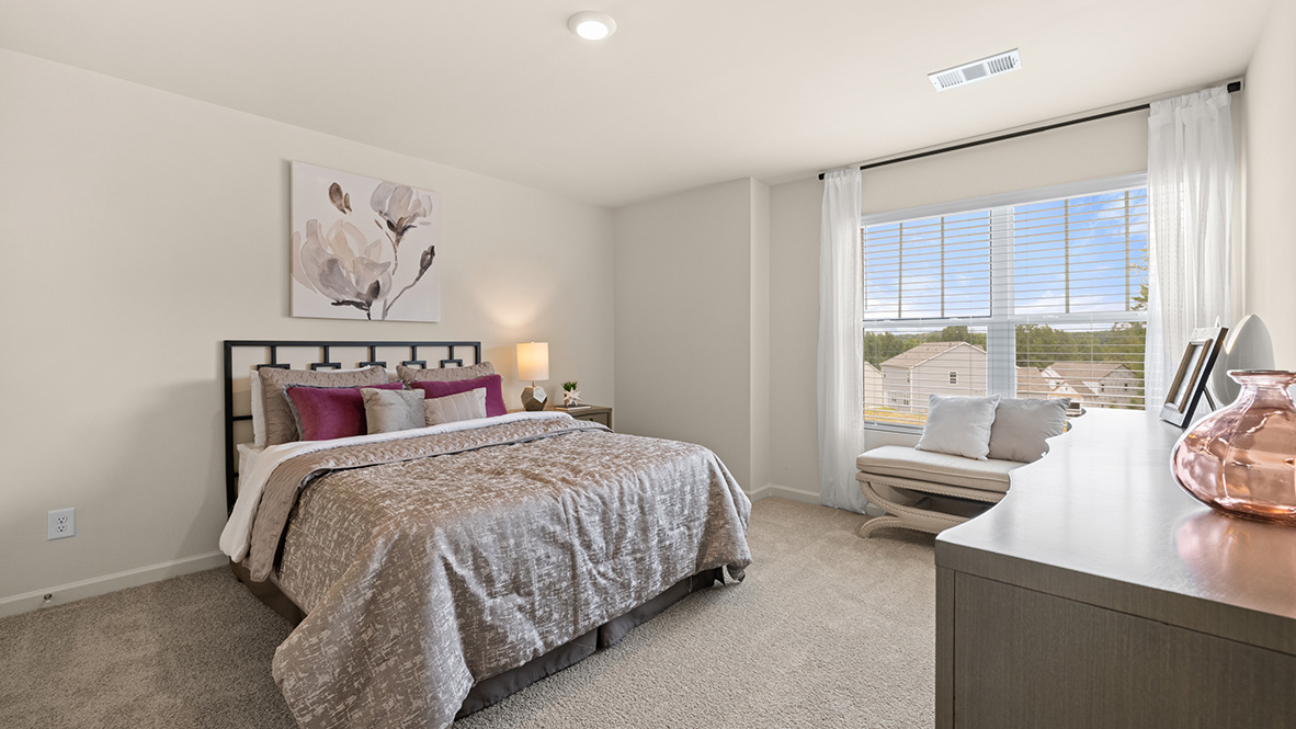 Bedroom with double window.