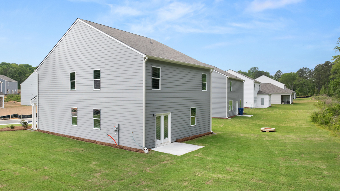 Back exterior elevation of Oakleigh Glen of two story home - Robie Plan