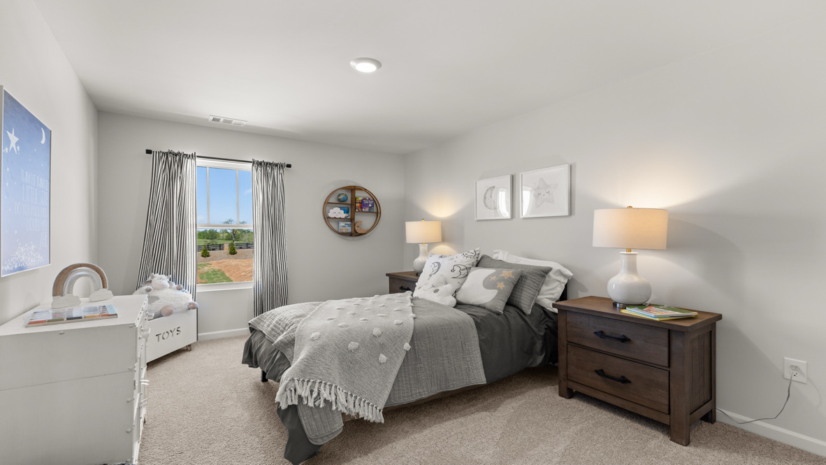 Loft + Secondary Bedroom New Home upstairs layout includes loft and secondary bedroom with open sightlines and easy access to shared bathroom