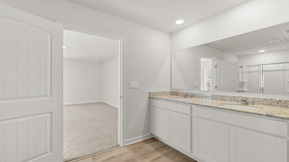 Interior primary bathroom with double sink
