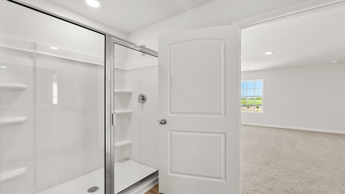 Interior primary bathroom with shower