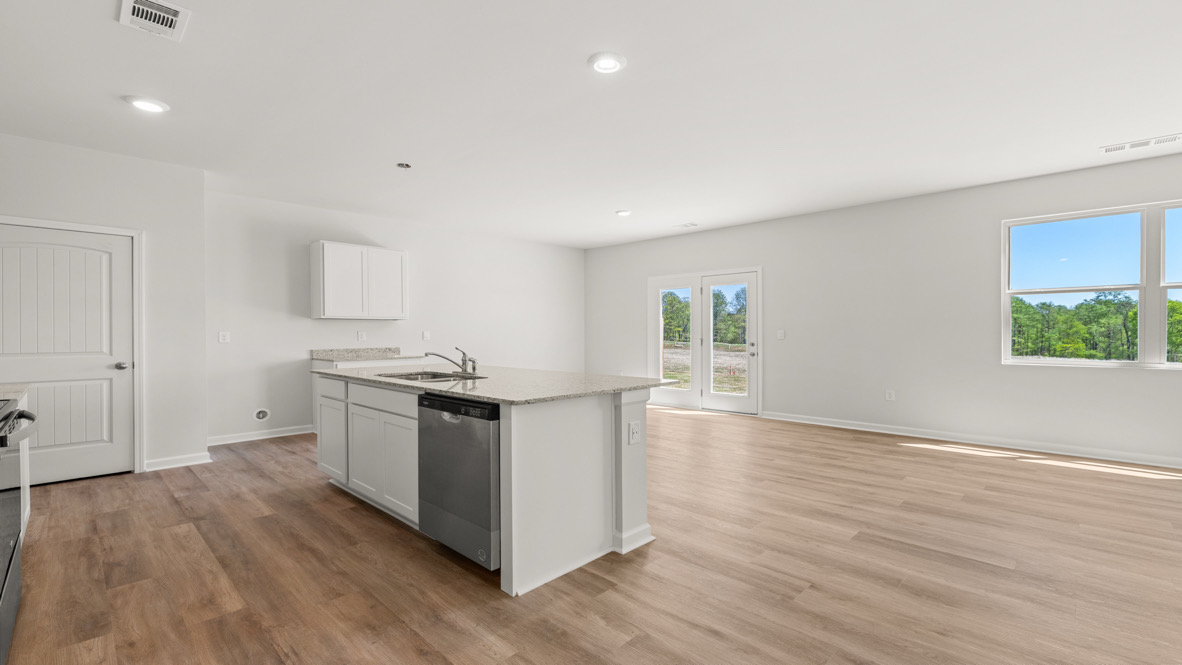Interior kitchen with center island open to living area