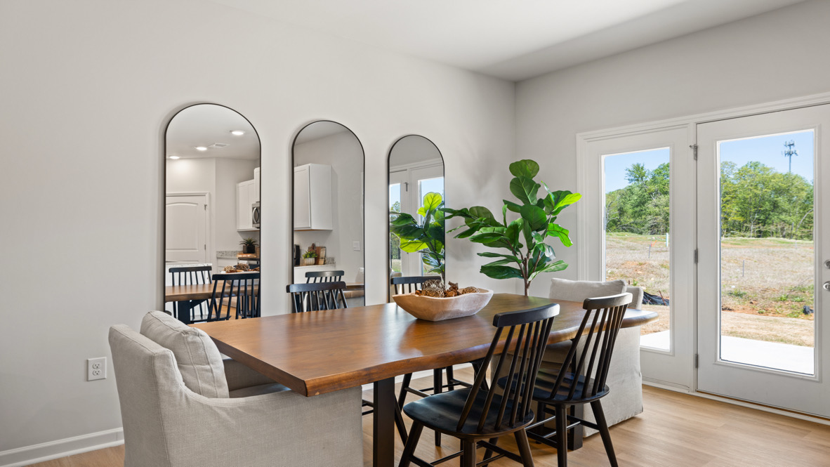 Interior dining area next to back patio doors