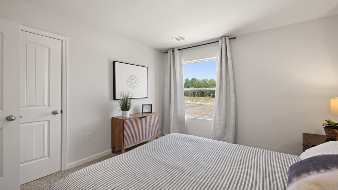 Interior bedroom with large window