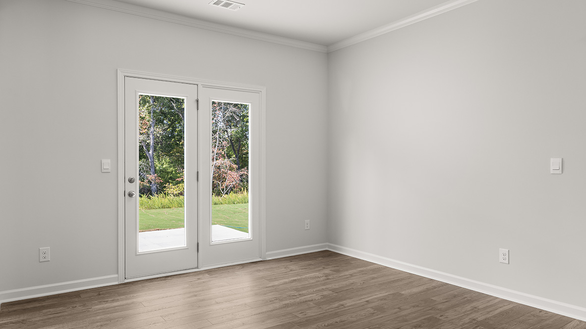 Interior dining area next to back patio doors