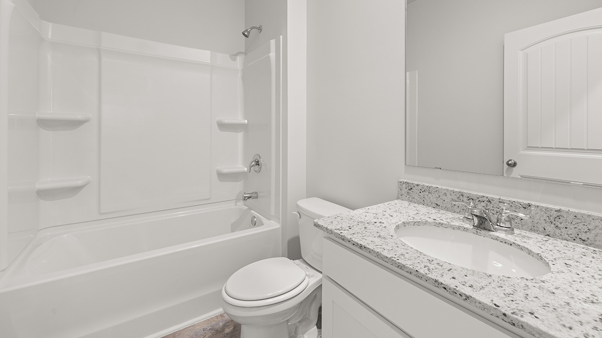 Interior bathroom with sink and full-sized shower