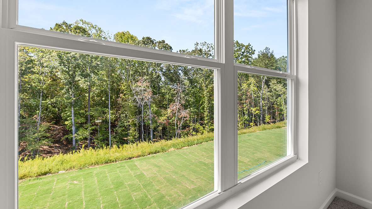 Interior upstairs loft area with large window