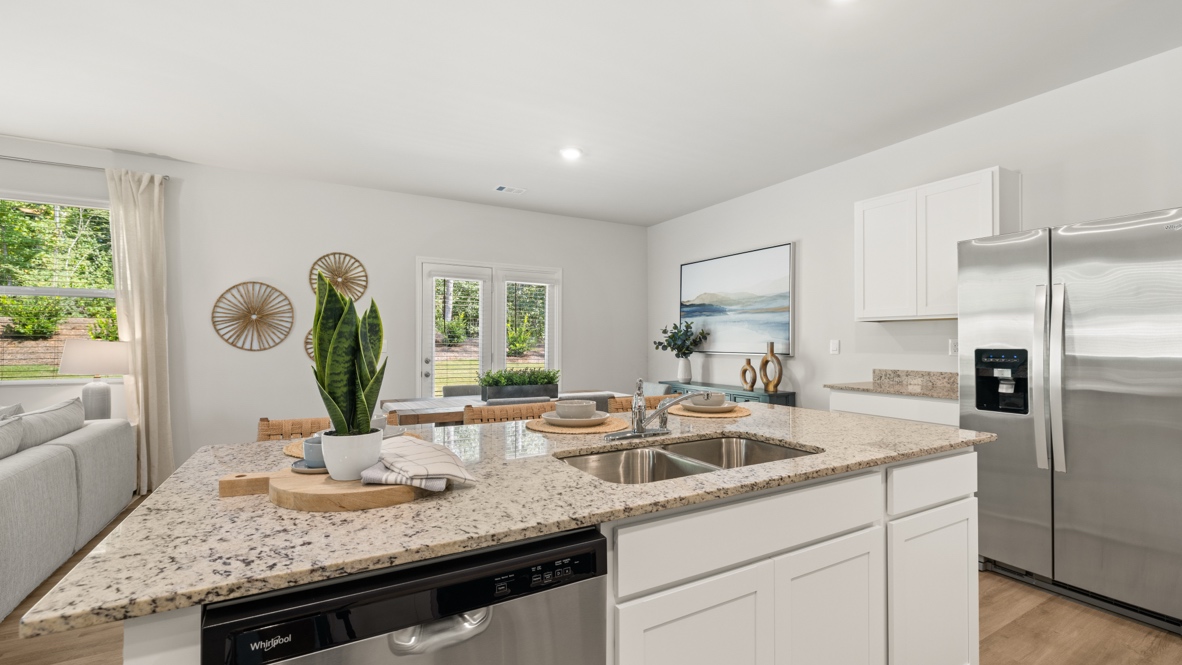 Interior kitchen with center island open to living area