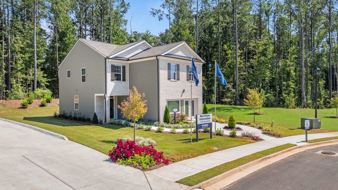 Exterior two-story home with stone detailing