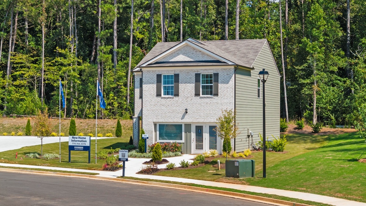 Exterior two-story home with stone detailing