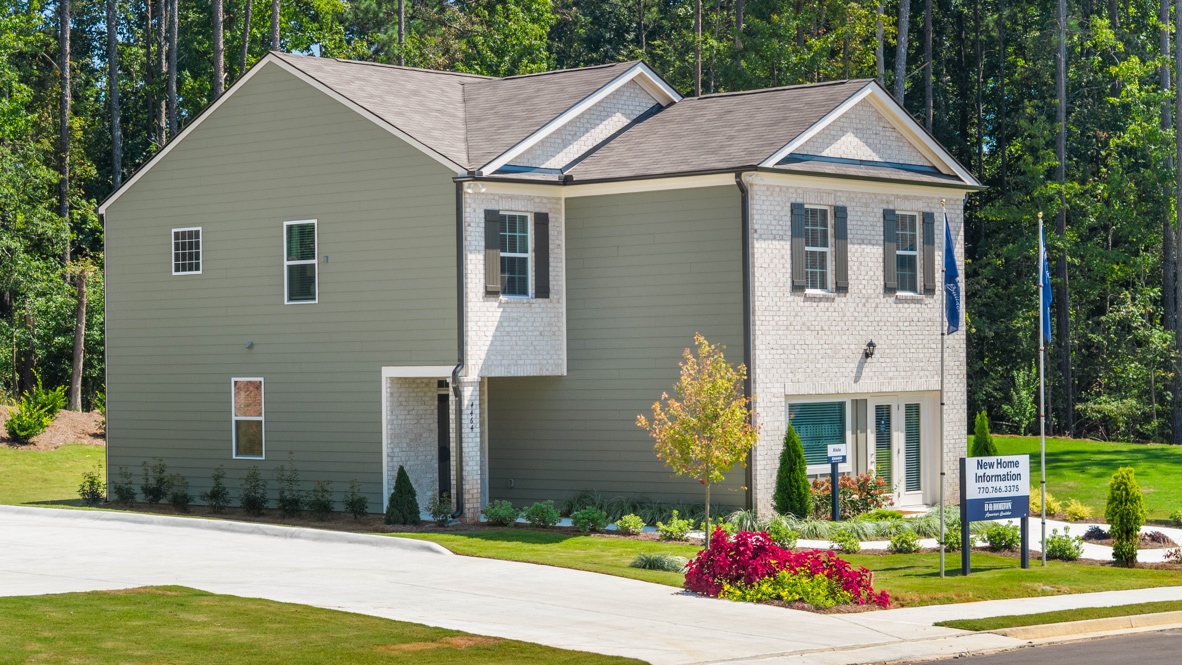 Exterior two-story home with stone detailing
