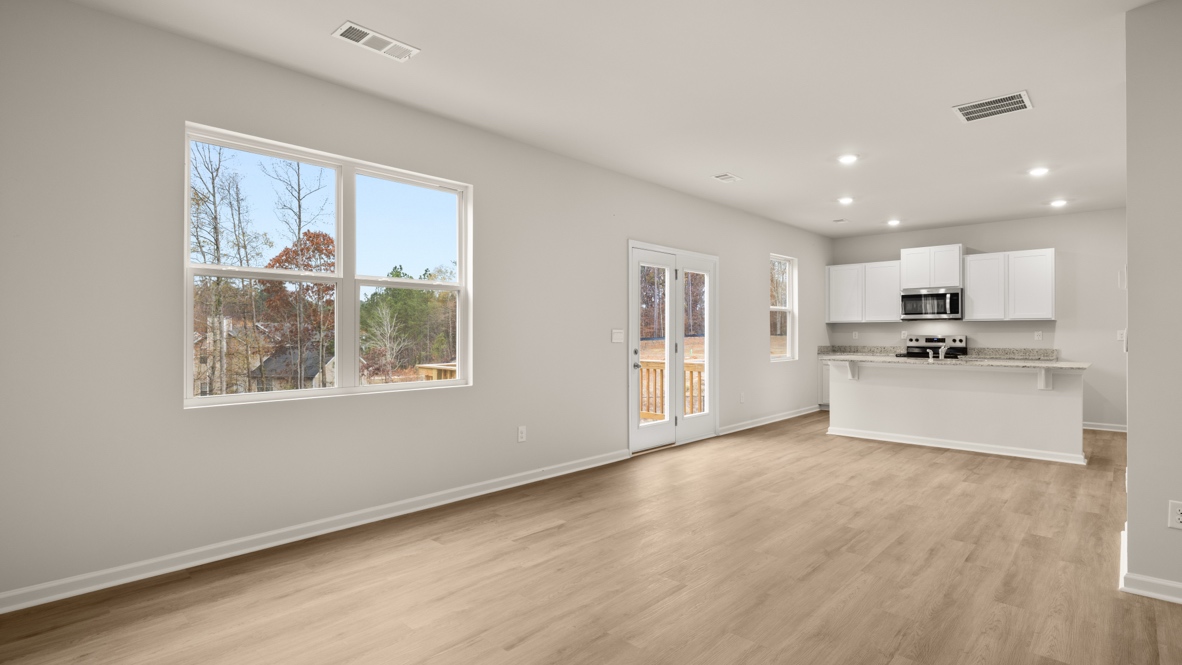 Interior living area open to kitchen with center island