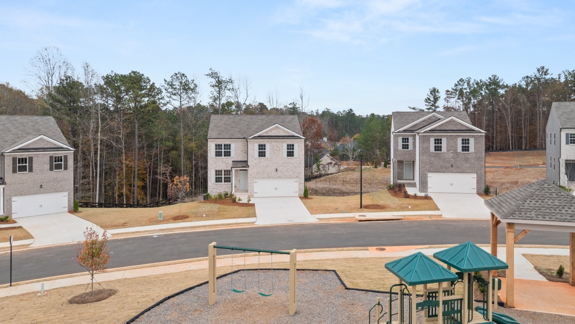 Exterior two-story homes with stone detailing
