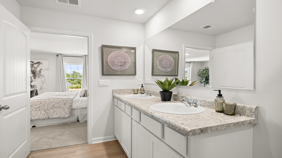 Interior primary bathroom with double sink