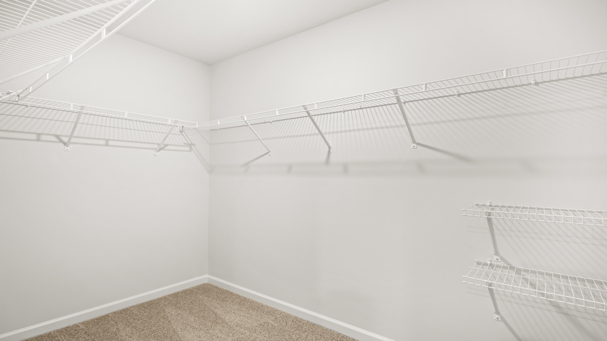 Interior primary walk-in closet