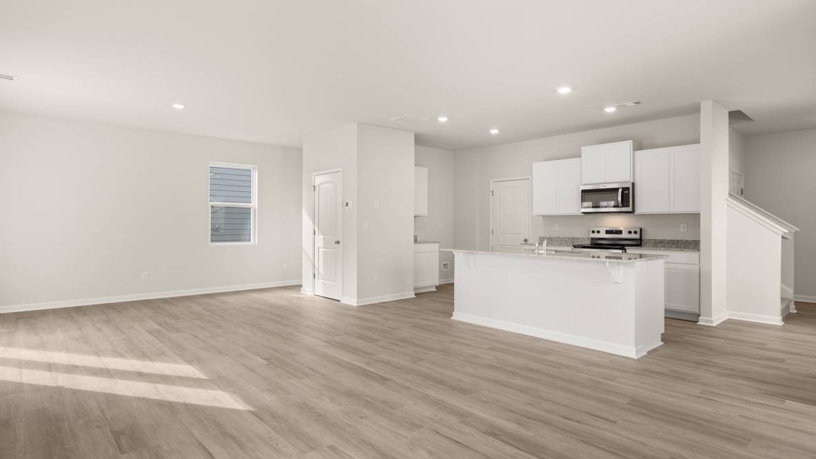 Interior living area open to kitchen with center island