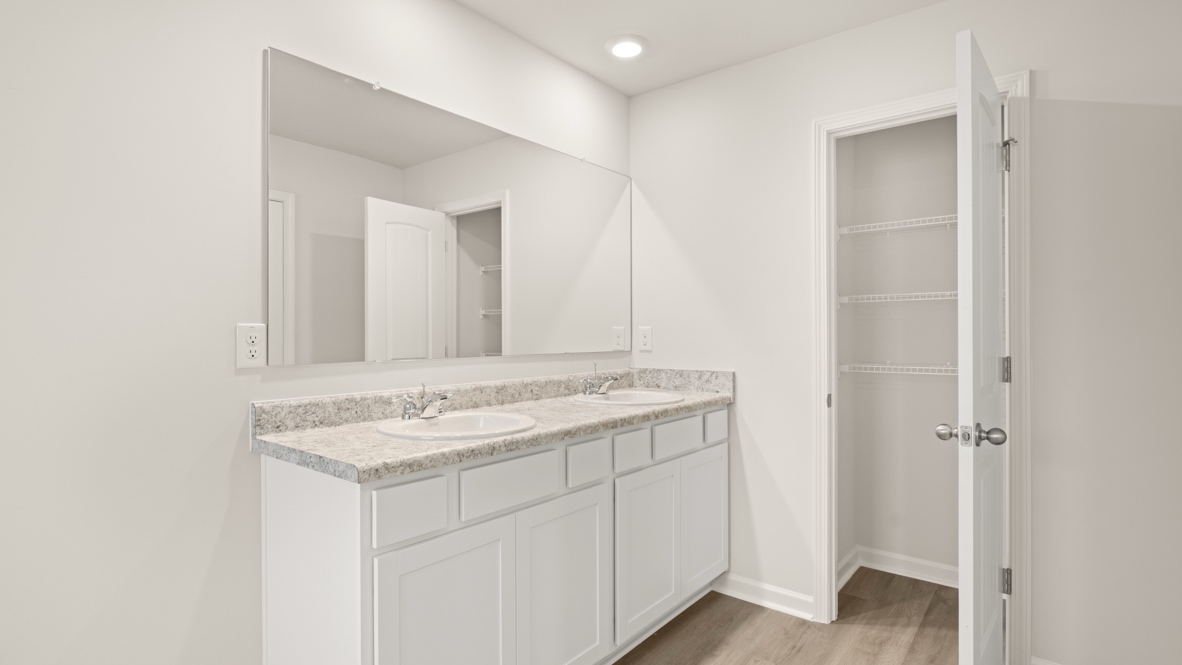 Interior primary bathroom with double sink