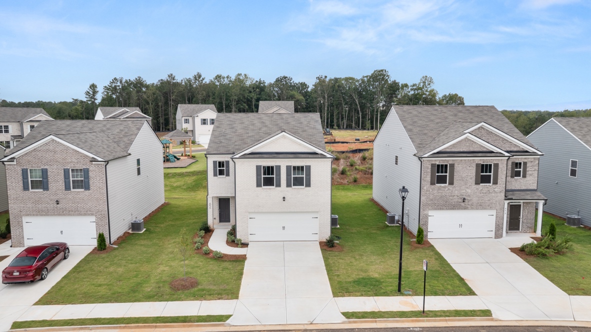 Exterior two-story homes with stone detailing