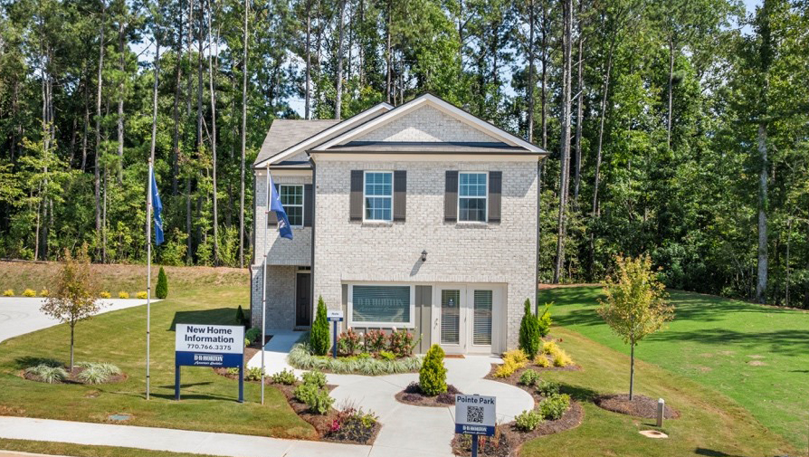 Exterior two-story home with stone detailing