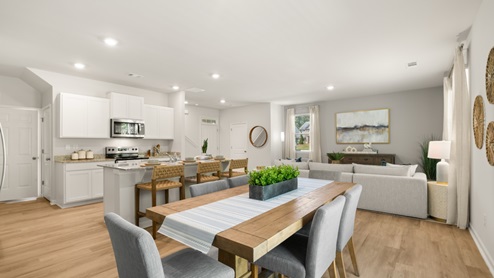 Interior dining area open to living area and kitchen