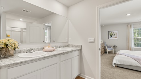 Interior primary bathroom with double sink