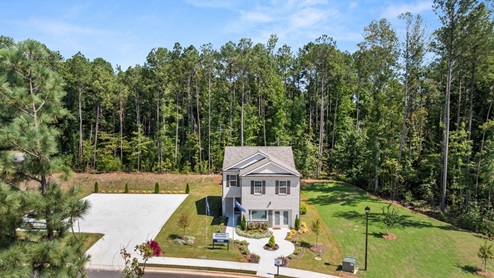 Exterior two-story home with stone detailing