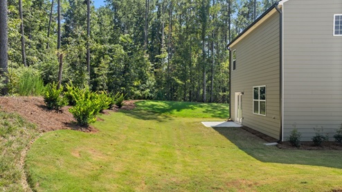 Exterior view of back yard and home