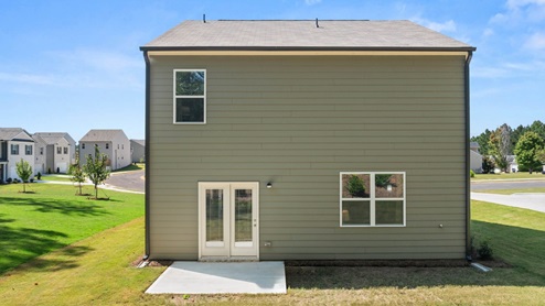 Exterior view of back yard and home