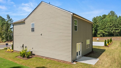 Exterior view of back yard and home