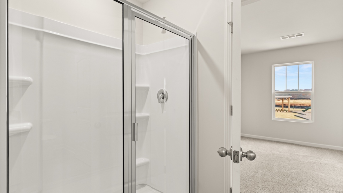 Interior primary bathroom with shower