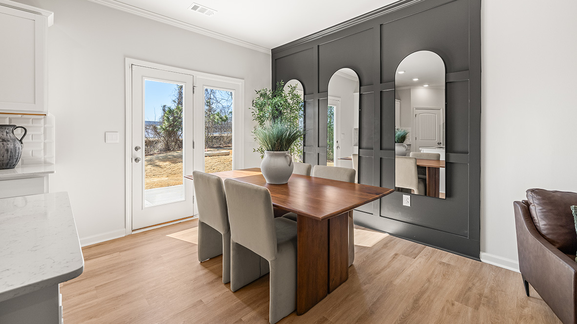 Interior dining area next to back patio door