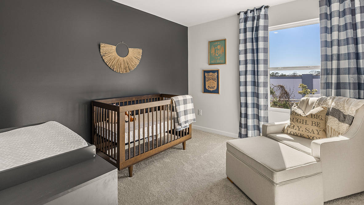 Interior bedroom with window and accent wall