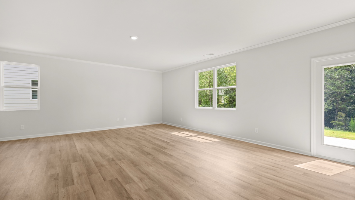 Open concept first floor with the living room, dining room and kitchen next to each other