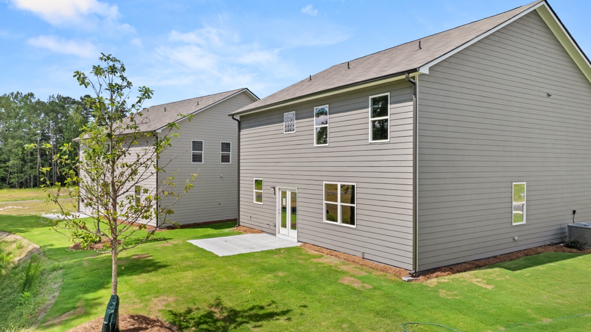 Exterior of the Hanover floorplan at Northwoods at Mirror Lake in Villa Rica, GA