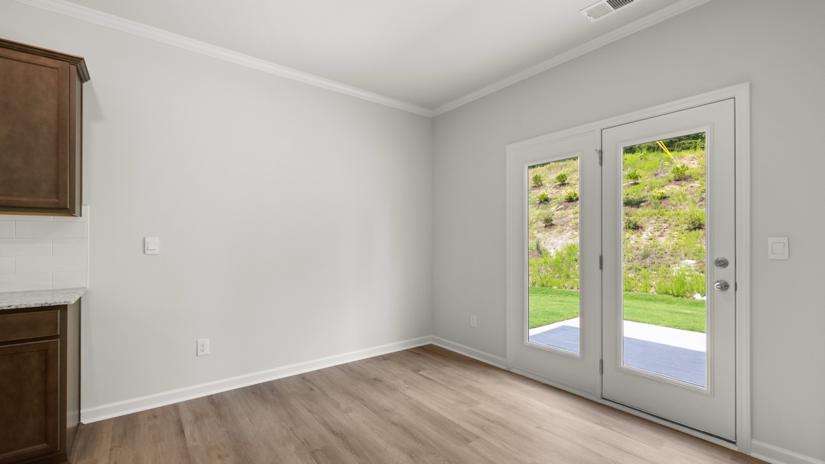 Open concept first floor with the living room, dining room and kitchen next to each other