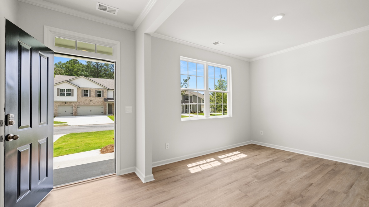Formal dining room next to the entrance of the home