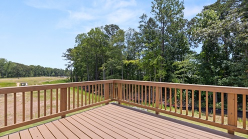wooden deck off of the living room doors