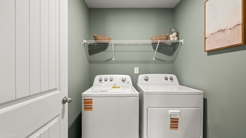 laundry room with side by side washer and dryer