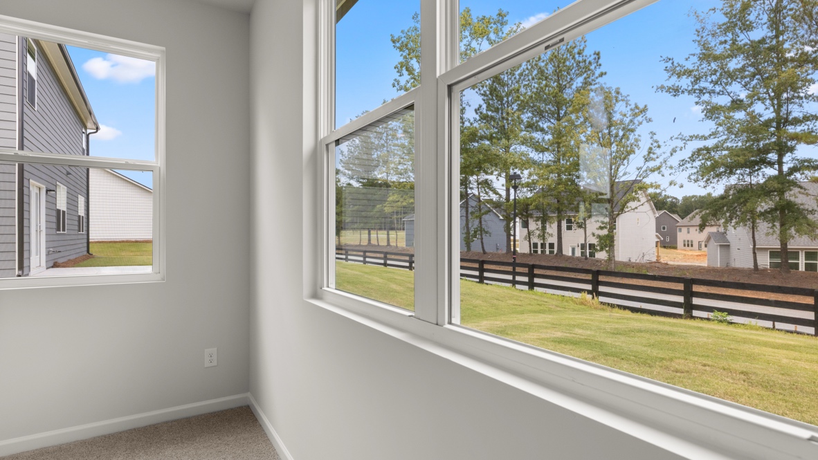 Interior bedroom with large windows