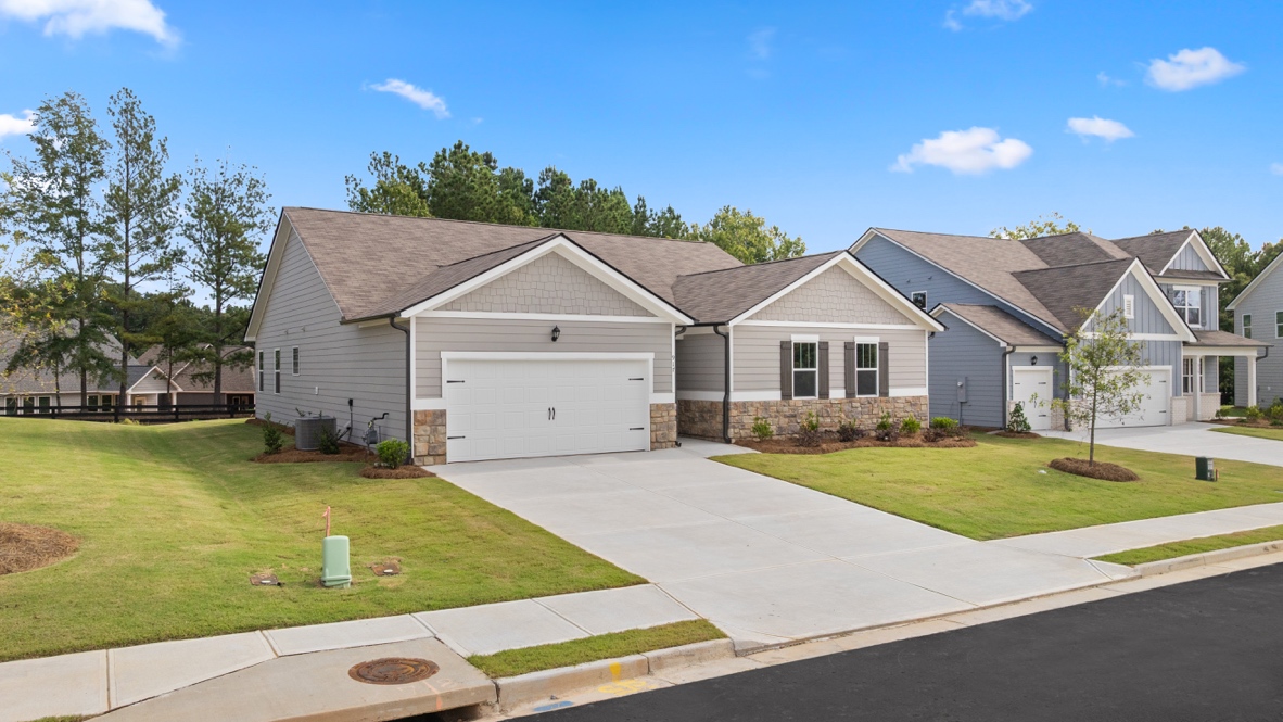 Exterior homes with stone detailing