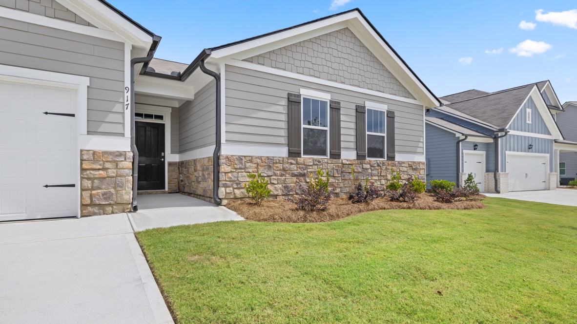 Exterior homes with stone detailing