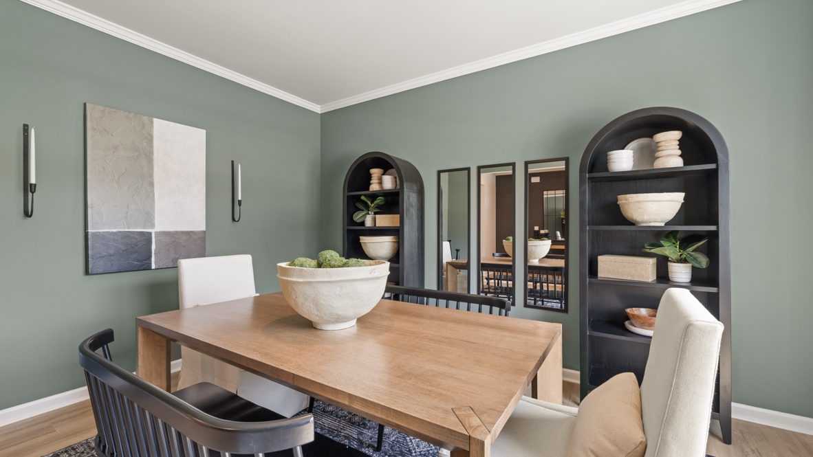 Interior dining area with green accent walls