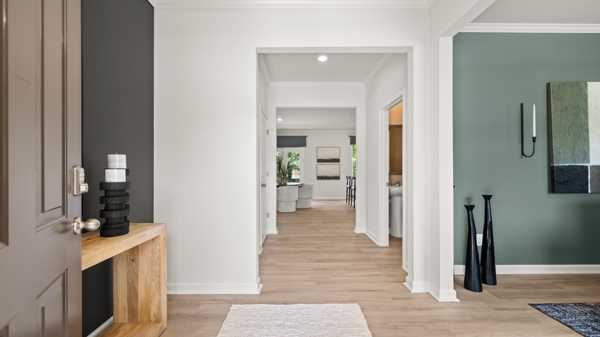 Interior entry-way leading to living area and hallway