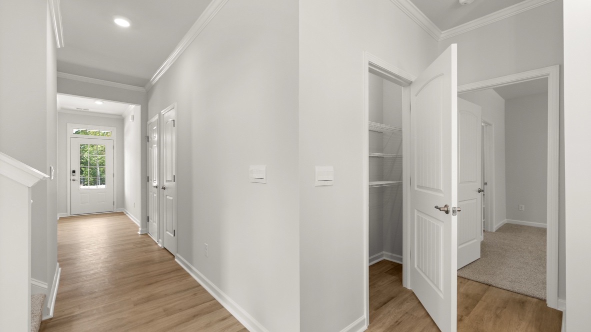 Interior hallway with call closet and next to bedroom