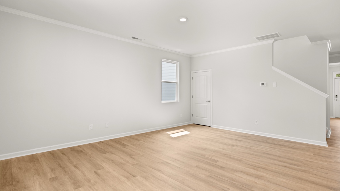 Interior living area with window and next to staircase