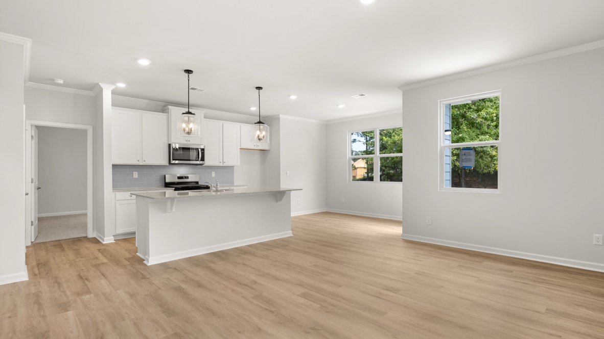 Interior living area open to kitchen with center island