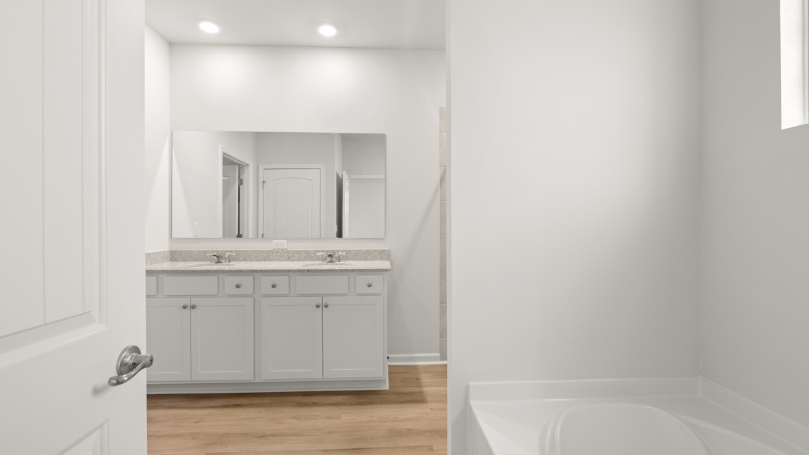 Interior primary bathroom with double sink